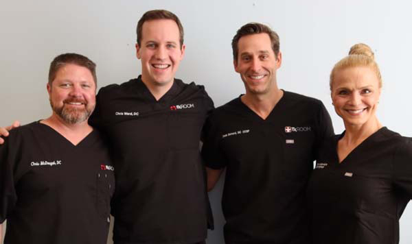 Chiropractor Plano TX Chris McDougal With Team