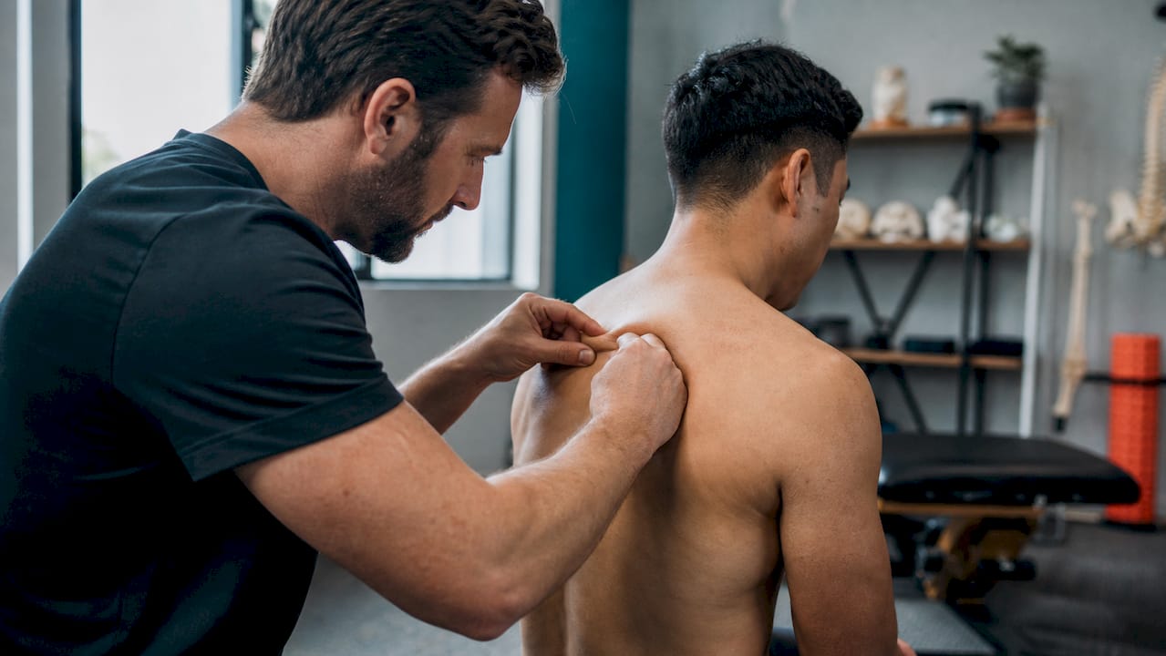 Fascial Distortion Model therapy on scapular region