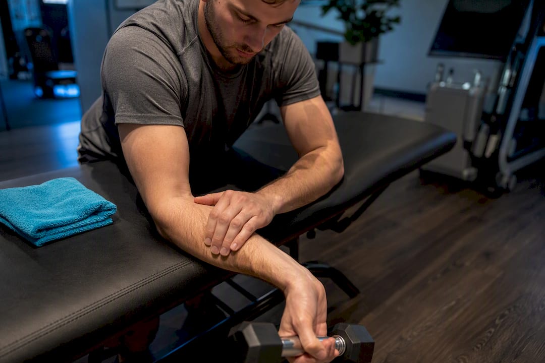 Rehab First Golfer’s Elbow Care: Fascia Work and Eccentric Rehab